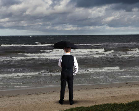 Collage with young businessman against weather backgroundの写真素材