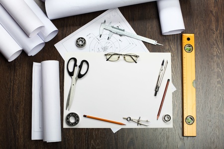 Tools and papers with sketches on the tableの写真素材