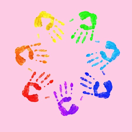 Colourful prints of human hands on white backgroundの写真素材