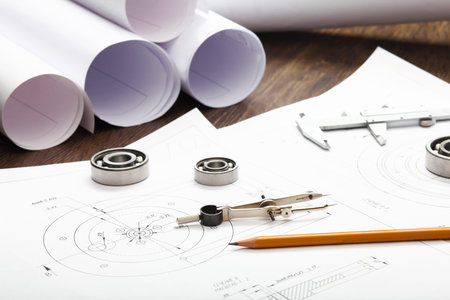 Tools and papers with sketches on the tableの写真素材