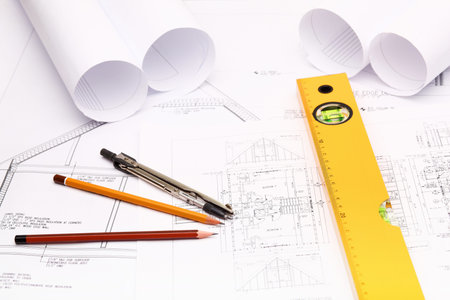 Tools and papers with sketches on the tableの写真素材