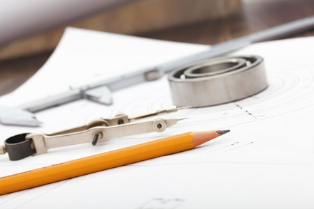 Tools and papers with sketches on the table