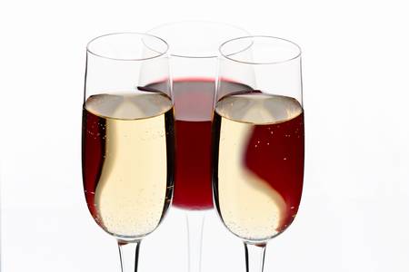 Glasses with wine on the color backgroundの写真素材