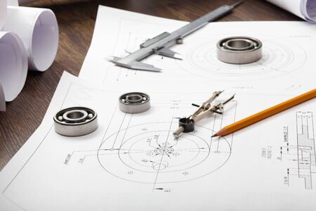 Tools and papers with sketches on the tableの写真素材