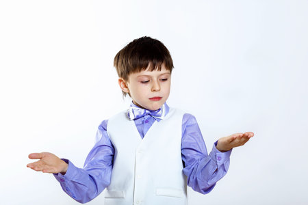 Portrait of a little boy dressed for a celebration