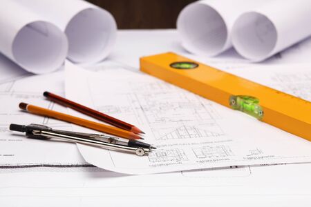 Tools and papers with sketches on the tableの写真素材