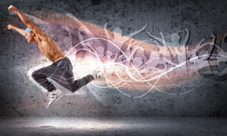 young man in a blue cap dancing hip hop - collageの写真素材