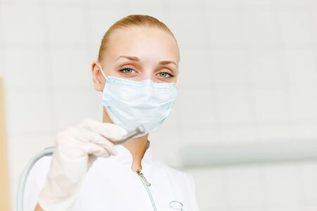 A portrait of a dental worker, dentist or assistant の写真素材
