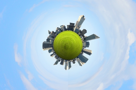 Planet earth with city on it against sky backgroundの写真素材