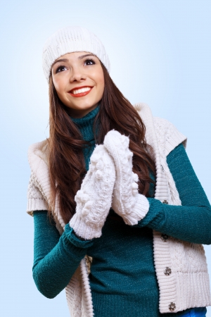Young pretty woman with lomng hair wearing warm pulloverの写真素材