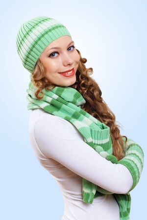 Young pretty woman with lomng hair wearing warm pulloverの写真素材