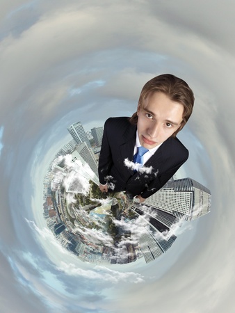 Planet earth with city on it against sky backgroundの写真素材