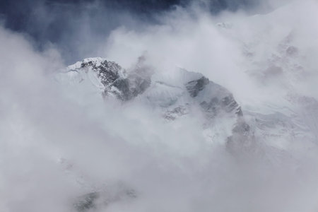 High mountains in white cloud  Nepal  Everest