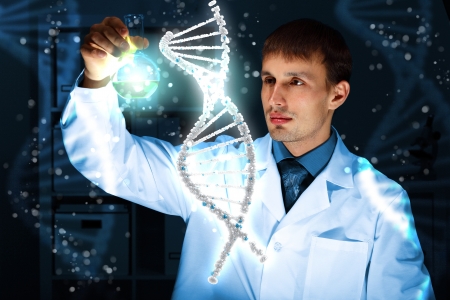 Image of DNA strand against colour backgroundの写真素材