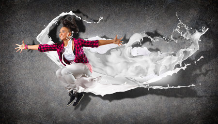 Modern style dancer jumping and paint splashes  Illustration