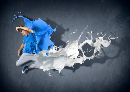 Modern style dancer jumping and paint splashes Illustrationの写真素材