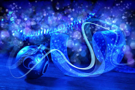 Blue Christmas collage  Decorations and ribbons on a blue backgroundの写真素材