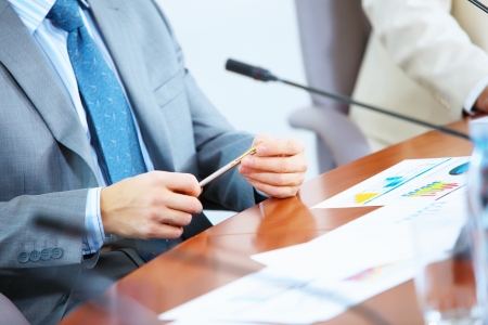 before a conference, the microphones in front of empty chairs の写真素材