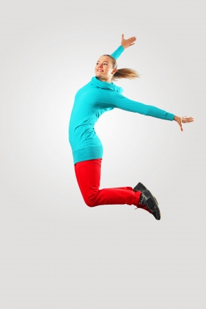 Young hiphop dancer making a move on whiteの写真素材