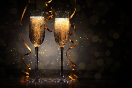 Two champagne glasses ready to bring in the New Yearの写真素材