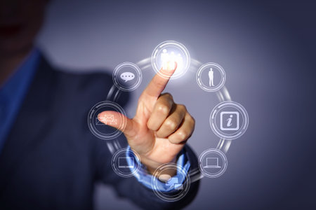 Business person pushing symbols on a touch screen interface