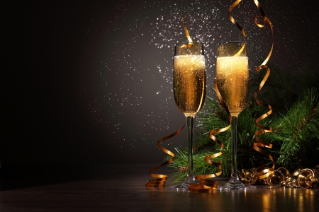 Two champagne glasses ready to bring in the New Yearの写真素材