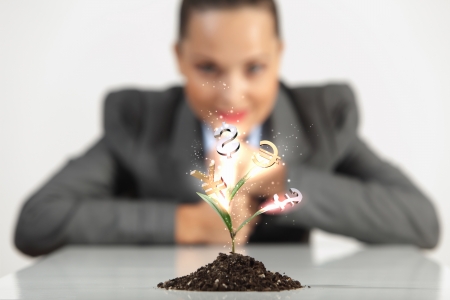 Money Sprouting - finance and money symbols sprouting from stemsの写真素材