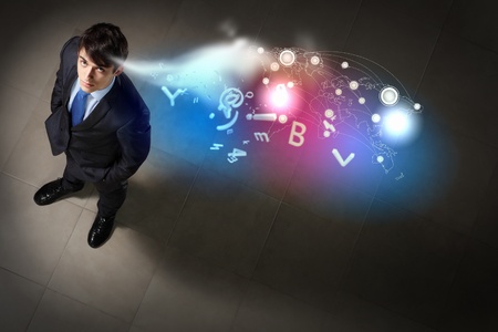 Top view of young businessman making decisionの写真素材