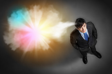 Top view of young businessman making decisionの写真素材