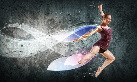 Girl dancing in a color dress with a gray background  Collageの写真素材