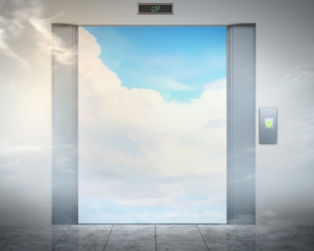 the elevator doors and the natural landscape behind themの写真素材