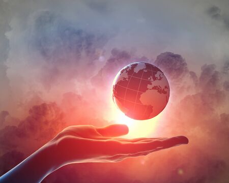 Image of hand holding earth planet against illustration backgroundの写真素材