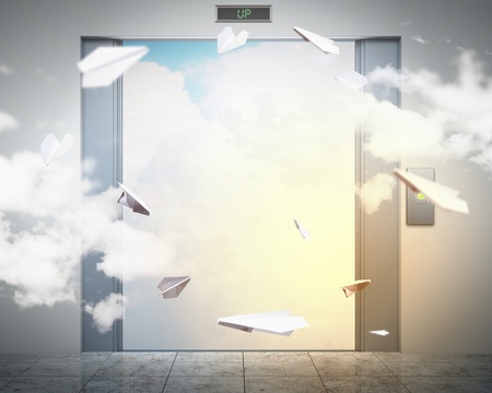 the elevator doors and the natural landscape behind themの写真素材