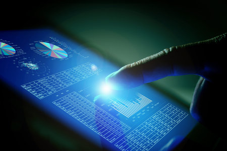 Closeup of finger touching blue toned screen on tablet-pc