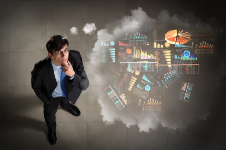 Top view of young businessman making decision diagram in airの写真素材