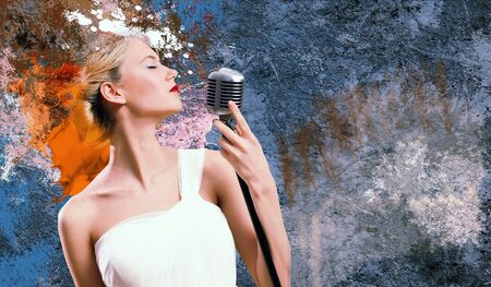 Image of female singer holding microphone against illustration backgroundの写真素材