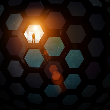 Silhouette of businessman standing in color backgroundの写真素材