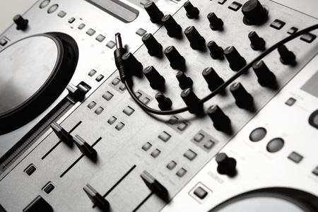 Dj mixer equipment to control sound and play musicの写真素材