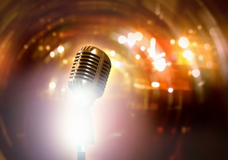 Let s sing  Stylish retro microphone on a colored backgroundの写真素材