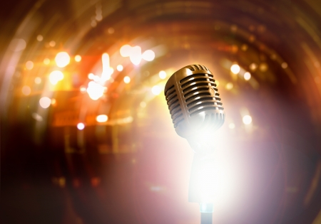 Let s sing  Stylish retro microphone on a colored backgroundの写真素材