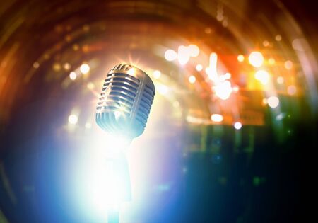 Let s sing  Stylish retro microphone on a colored backgroundの写真素材