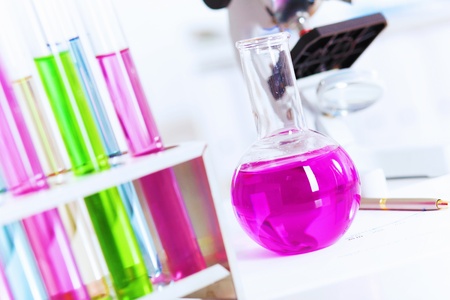 Chemistry laboratory glassware with colour liquids in themの写真素材