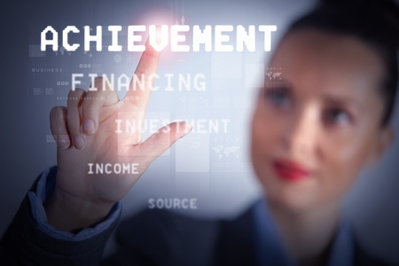 Business woman touching virtual display  Business and technology conceptの写真素材
