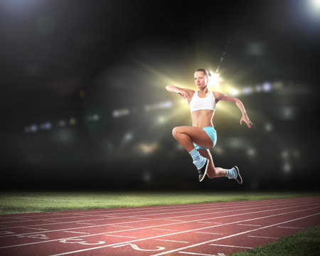Image of young attractive sport woman exercising