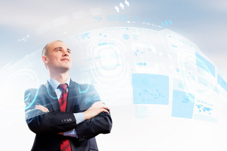 Image of confident businessman smiling standing against hightech backgroundの写真素材