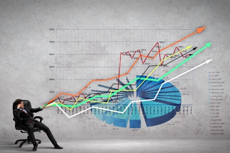 Image of young businessman pulling graph  Chart growth conceptの写真素材