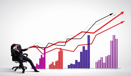 Image of young businessman pulling graph  Chart growth conceptの写真素材