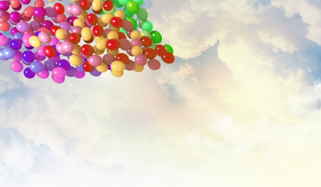 Image of colorful balloons flying in skyの写真素材