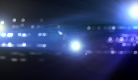 Abstract image of light flashes against dark background
