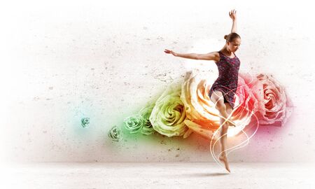 Girl dancing in a color dress with a gray background  Collageの写真素材